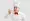 Happy male Indian chef with crossed arms wearing white chef uniform on transparent 