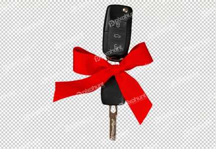 Isolated car keys with a red bow as a gift | Car key with red ribbon