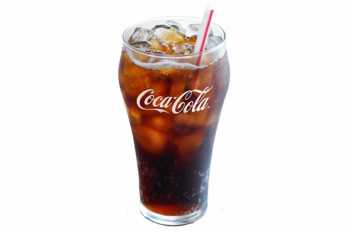 Glass-filled coke and ice with a straw